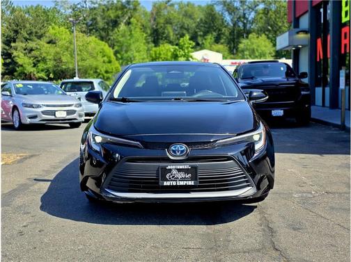 Midnight Black Metallic 2024 Toyota Corolla Hybrid SE