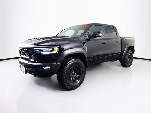 Diamond Black Crystal Pearlcoat 2026 RAM 1500 RHO Crew Cab 4x4 5'7' Box