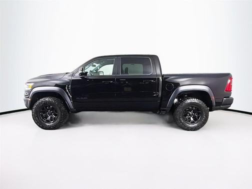 Diamond Black Crystal Pearlcoat 2026 RAM 1500 RHO Crew Cab 4x4 5'7' Box