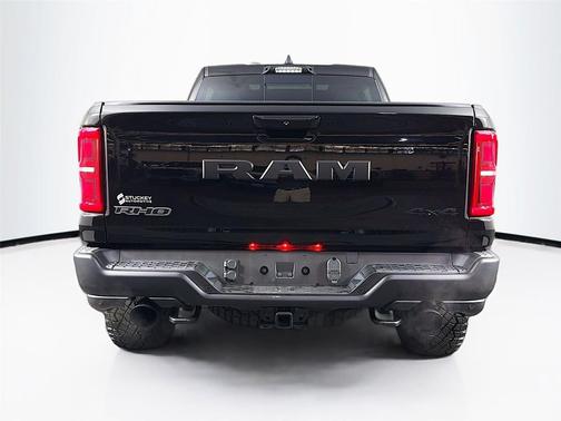 Diamond Black Crystal Pearlcoat 2026 RAM 1500 RHO Crew Cab 4x4 5'7' Box