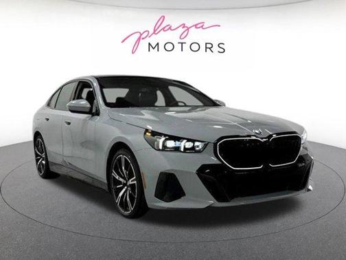 Gray Metallic 2026 BMW 550e xDrive