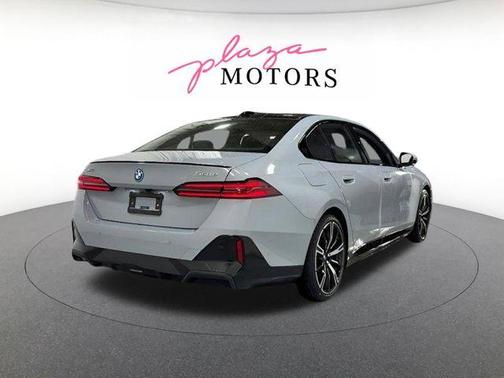 Gray Metallic 2026 BMW 550e xDrive