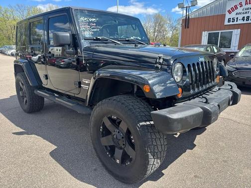 Black 2012 Jeep Wrangler Unlimited Sahara