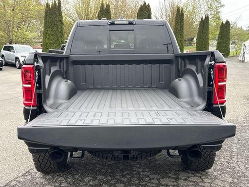 Diamond Black Crystal Pearlcoat 2026 RAM 1500 RHO Crew Cab 4x4 5'7' Box