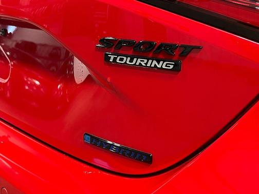 Red 2026 Honda Civic Hybrid Sport Touring