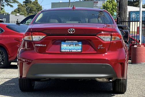 Ruby Flare Pearl 2026 Toyota Corolla Hybrid LE