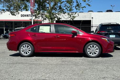 Ruby Flare Pearl 2026 Toyota Corolla Hybrid LE