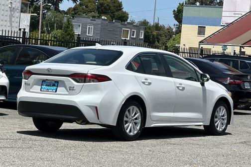 Wind Chill Pearl 2026 Toyota Corolla Hybrid XLE