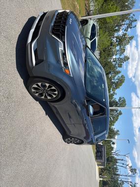 Astra Blue 2024 Kia Carnival EX FWD