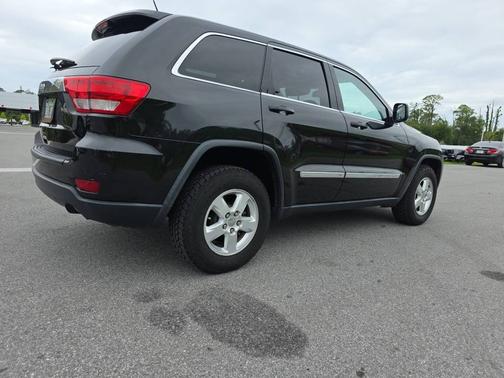 Brilliant Black Crystal Pearl 2012 Jeep Grand Cherokee RWD 4dr Laredo