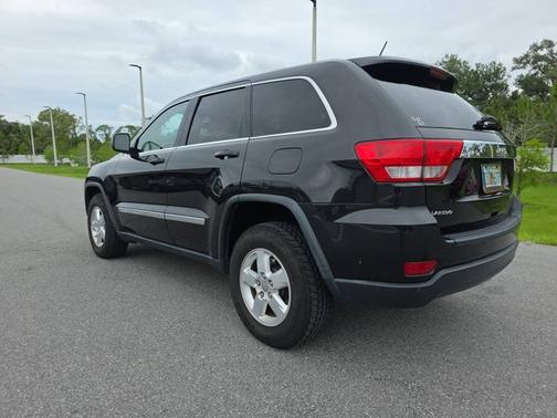 Brilliant Black Crystal Pearl 2012 Jeep Grand Cherokee RWD 4dr Laredo
