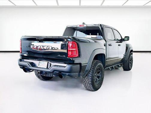 Diamond Black Crystal Pearlcoat 2025 RAM 1500 RHO Crew Cab 4x4 5'7' Box