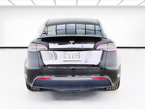 Solid Black 2025 Tesla Model Y Performance Dual Motor All-Wheel Drive