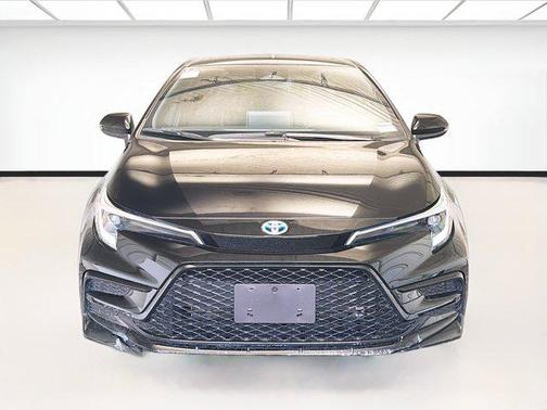 Midnight Black Metallic 2025 Toyota Corolla Hybrid SE