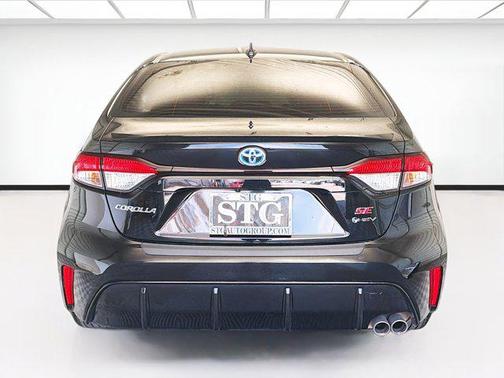 Midnight Black Metallic 2025 Toyota Corolla Hybrid SE