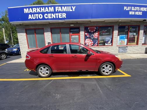 Red 2009 Ford Focus SES