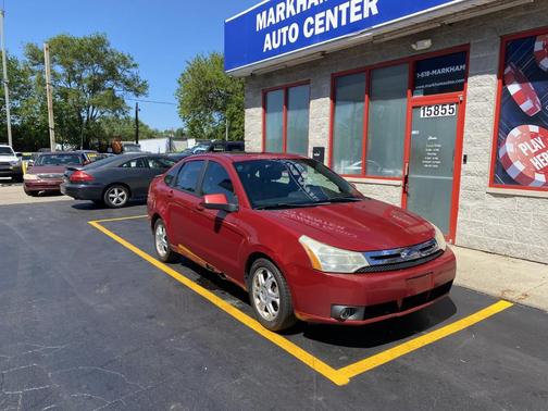 Red 2009 Ford Focus SES