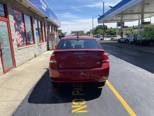 Red 2009 Ford Focus SES
