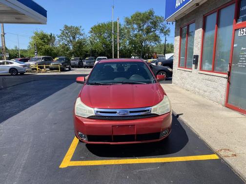 Red 2009 Ford Focus SES