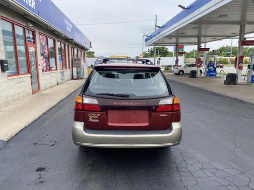 Red 2002 Subaru Outback Limited