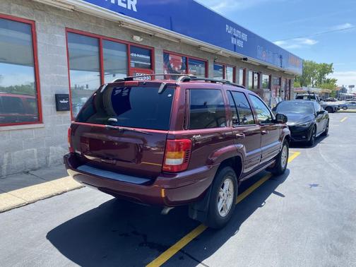 Red 1999 Jeep Grand Cherokee Limited 4WD