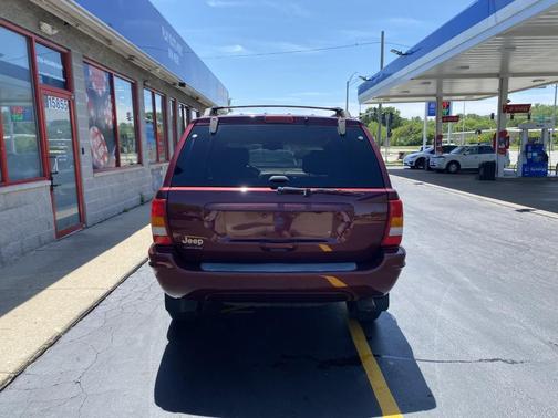 Red 1999 Jeep Grand Cherokee Limited 4WD