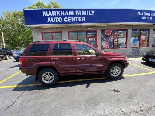 Red 1999 Jeep Grand Cherokee Limited 4WD