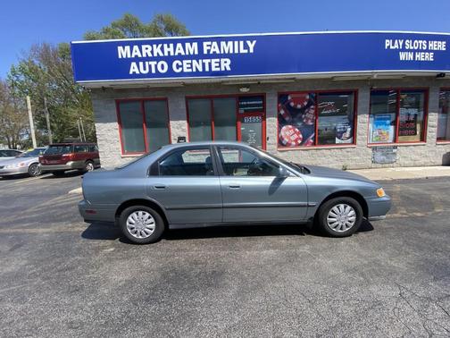 Light Blue sky 1994 Honda Accord LX