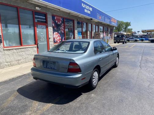Light Blue sky 1994 Honda Accord LX