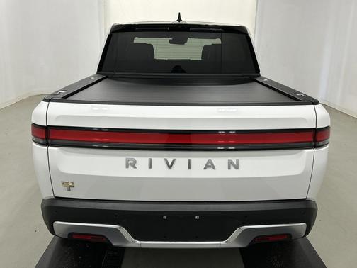 Glacier White 2024 Rivian R1T Adventure Quad Motor Large Pack