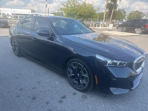 Carbon Black Metallic 2025 BMW 540 i xDrive