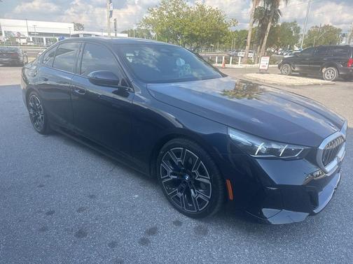 Carbon Black Metallic 2025 BMW 540 i xDrive