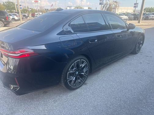 Carbon Black Metallic 2025 BMW 540 i xDrive