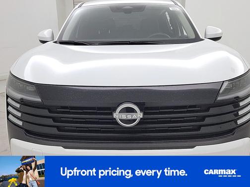 White 2025 Nissan Kicks SV