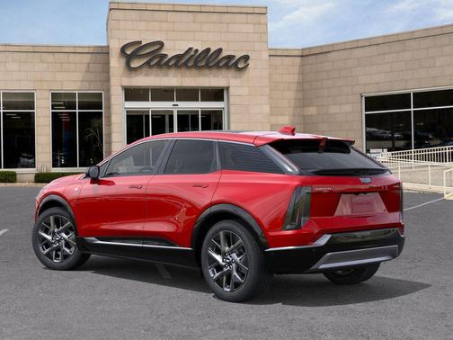 Radiant Red Tintcoat 2026 Cadillac OPTIQ Luxury