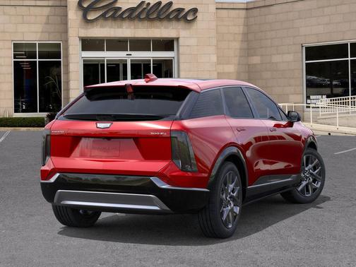 Radiant Red Tintcoat 2026 Cadillac OPTIQ Luxury
