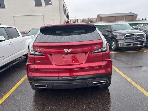 Radiant Red Tintcoat 2025 Cadillac XT4 Sport
