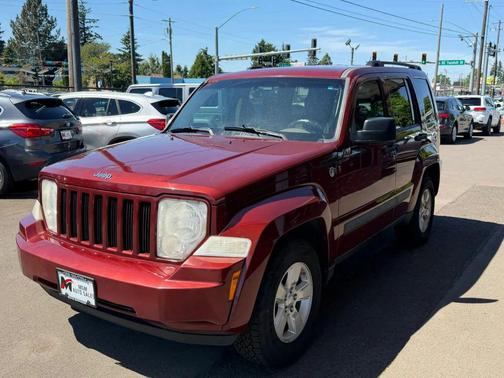 Red 2009 Jeep Liberty Sport