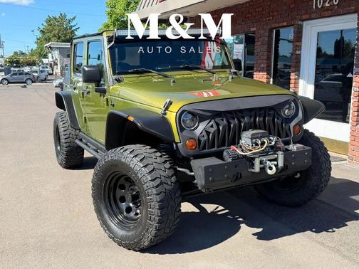 Green 2010 Jeep Wrangler Unlimited Sport