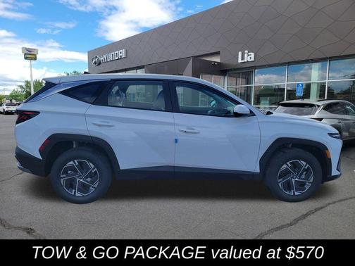 Creamy White Pearl 2026 Hyundai TUCSON Hybrid Blue SE