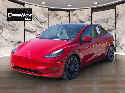 Red 2023 Tesla Model Y Performance Dual Motor All-Wheel Drive