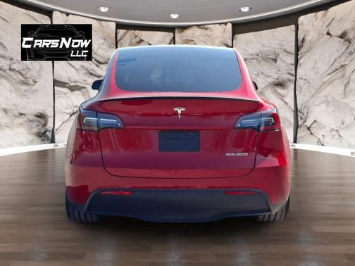Red 2023 Tesla Model Y Performance Dual Motor All-Wheel Drive