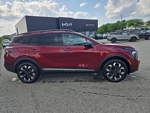 Dawning Red 2023 Kia Sportage X-Line