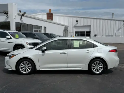 Wind Chill Pearl 2025 Toyota Corolla Hybrid LE