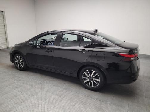 Scarlet Ember Tintcoat 2025 Nissan Versa 1.6 SV