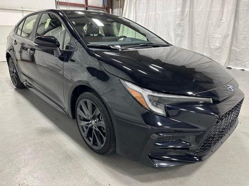Midnight Black Metallic 2025 Toyota Corolla Hybrid SE