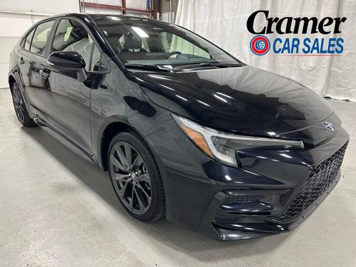 Midnight Black Metallic 2025 Toyota Corolla Hybrid SE