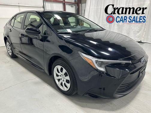 Midnight Black Metallic 2025 Toyota Corolla Hybrid LE