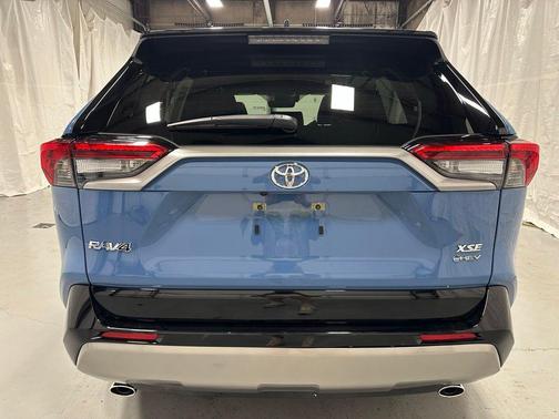 Cavalry Blue/Midnight Black Metallic 2025 Toyota RAV4 Hybrid SE