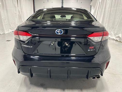 Midnight Black Metallic 2025 Toyota Corolla Hybrid SE